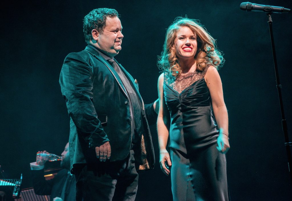 Joanna Forest onstage with Paul Potts at The Palace Theatre in London